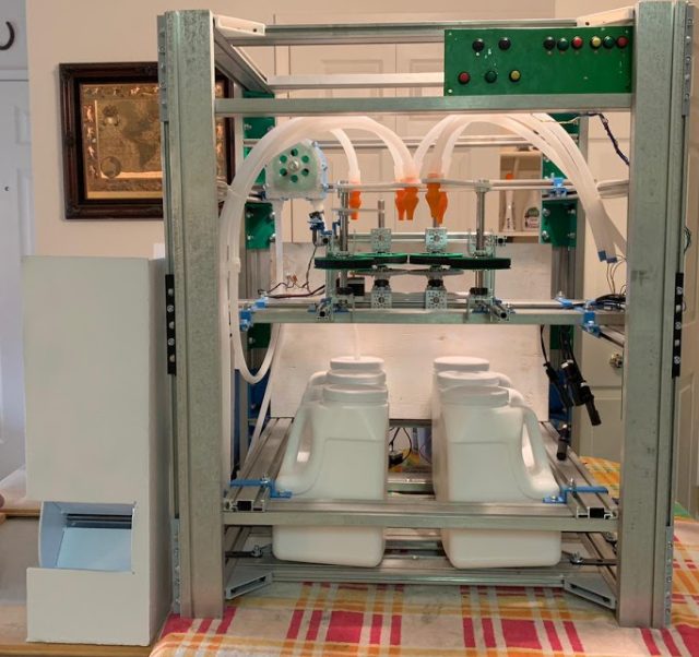 Completed PHILD vending machine prototype with tubing and refillable reservoirs