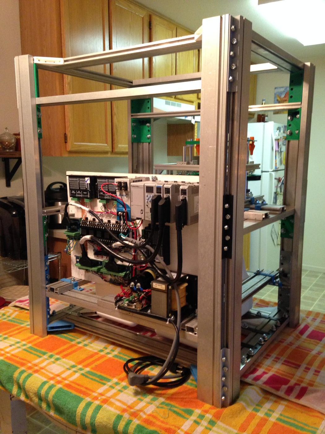 Aluminum extrusion frame and PLC wiring for the PHILD machine